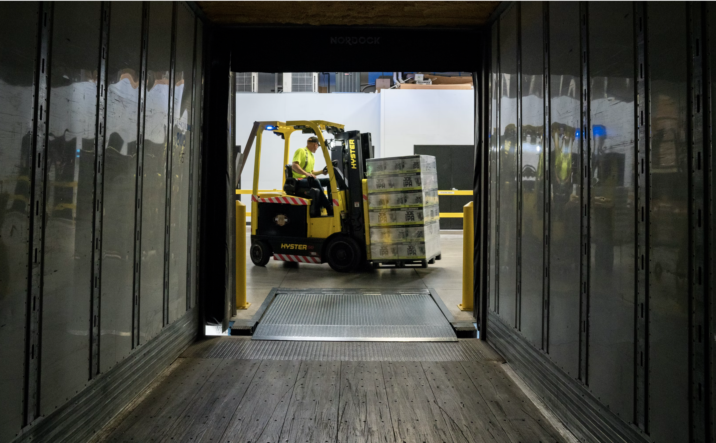 forklift loading a 53 foot box truck